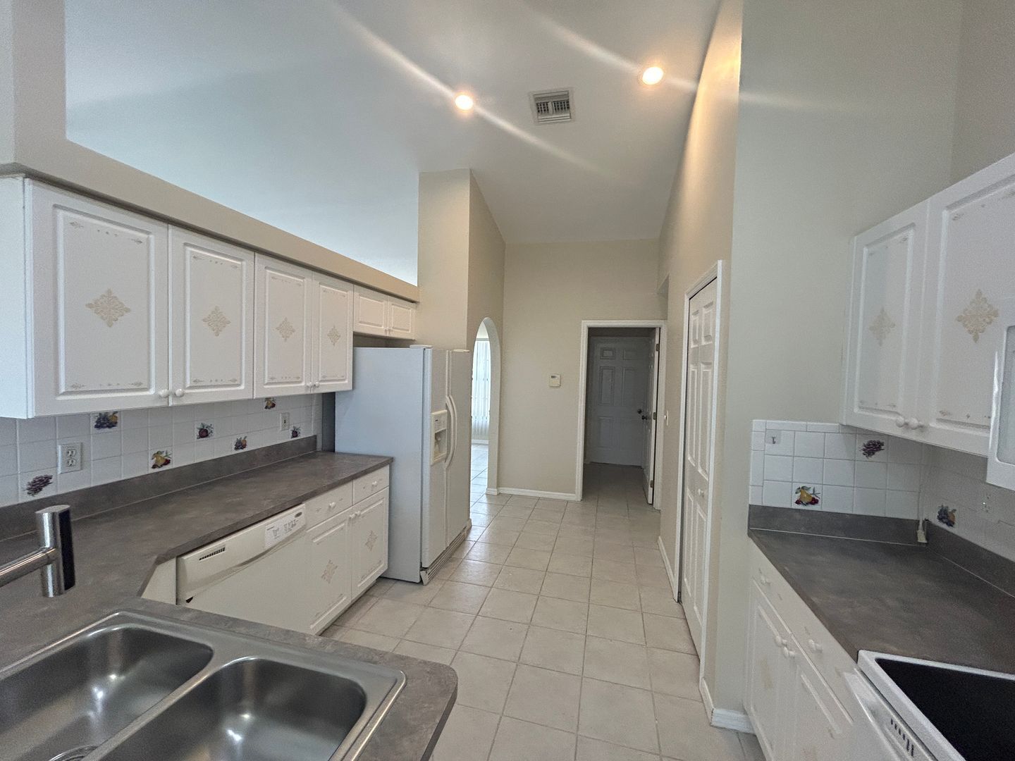 Building Photo - Freshly painted interior 2/2  spacious home on fresh water canal