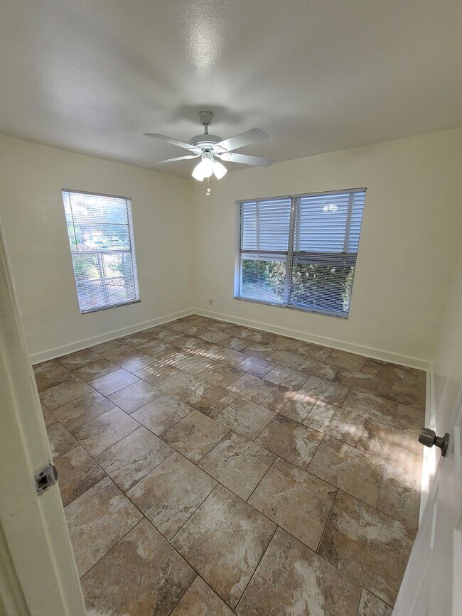 Building Photo - Stunning Corner-Lot Rental: 4BR/2BA with Courtyard