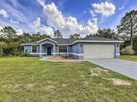 Building Photo - Peaceful Backyard Views! 3BR Home on Nearly Half an Acre with Screened Porch