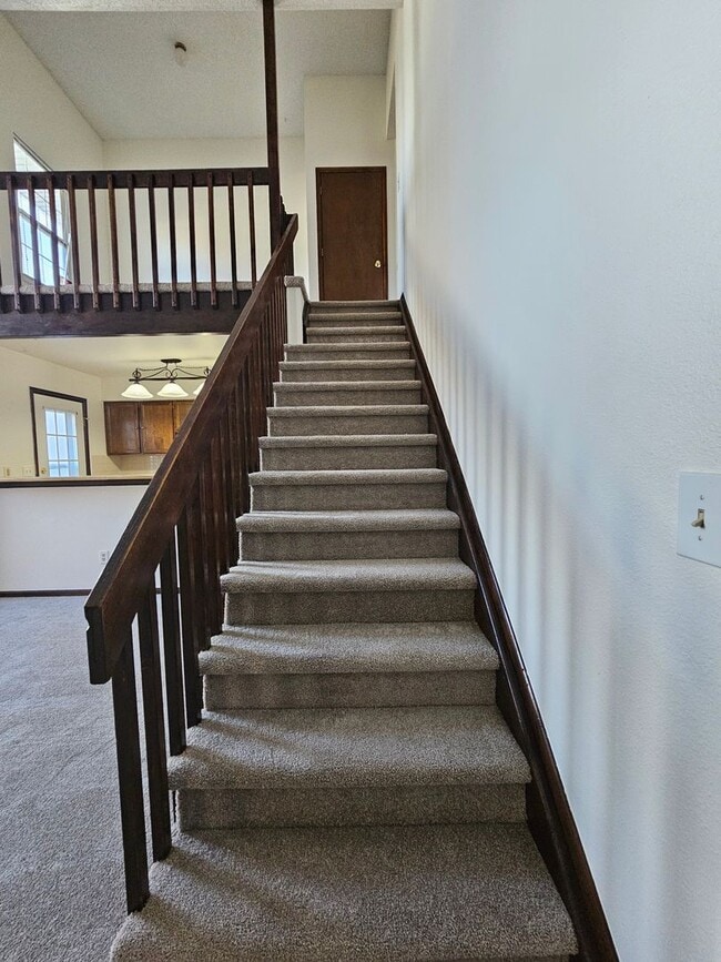 Building Photo - End Unit Condo with Private Patio