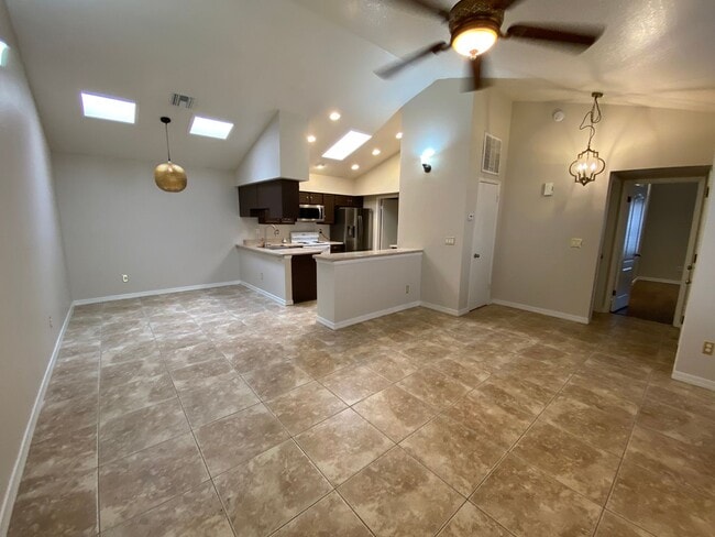 Building Photo - Quaint Retreat: 2BR/2BA Haven with Private Yard, Vaulted Ceilings & Cozy Fireplace