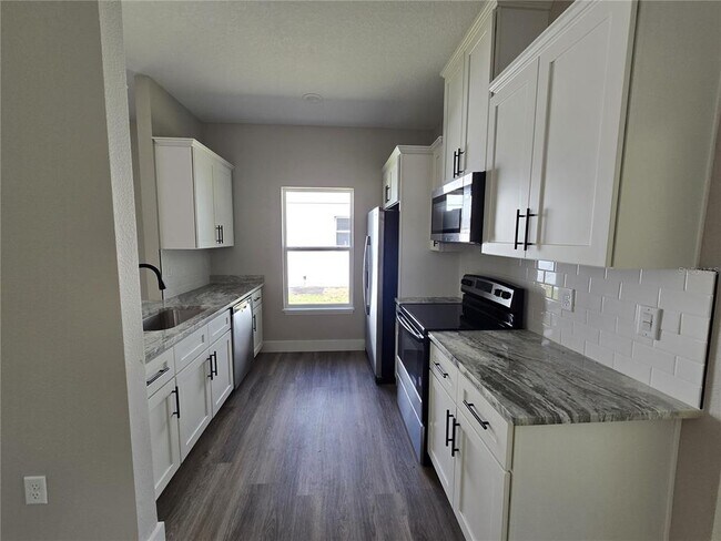 Building Photo - 7435 Mead Dr