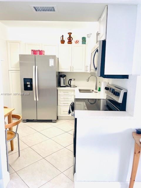 Building Photo - 3675 N Country Club Dr