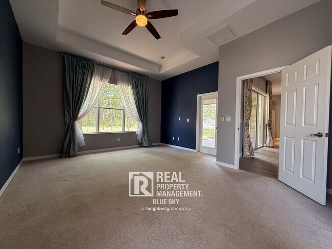 Building Photo - Executive Home with Custom Finishes in Gat...