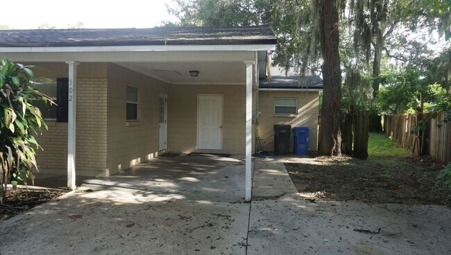 Building Photo - Four Bed - Three Bath - Large Storage Area...