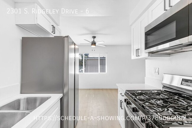 Building Photo - Beautiful newly remodeled modern Top-Floor...