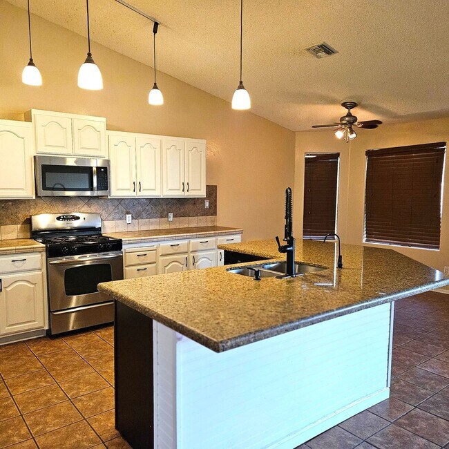 Building Photo - Pool home available now!