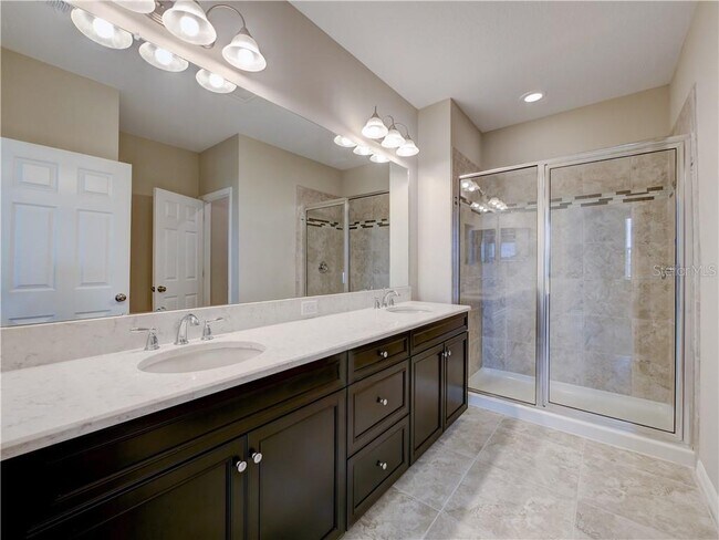 High quality, Shower with two sinks and standing shower plus the toilet. Lots of cabinets. Private c - 1074 Amber Leaf Trail