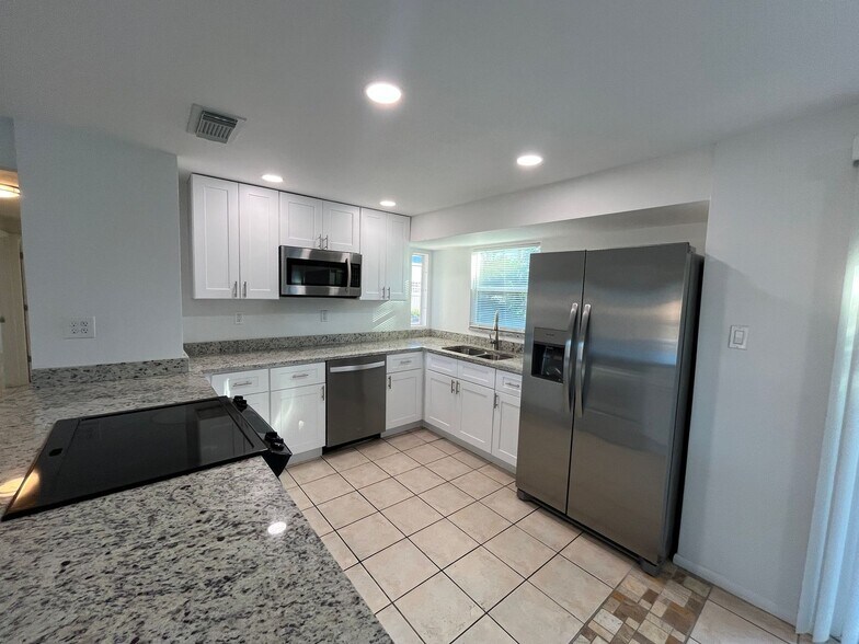 Building Photo - Updated 3-Bedroom Home with Granite Kitchen & One-Car Garage