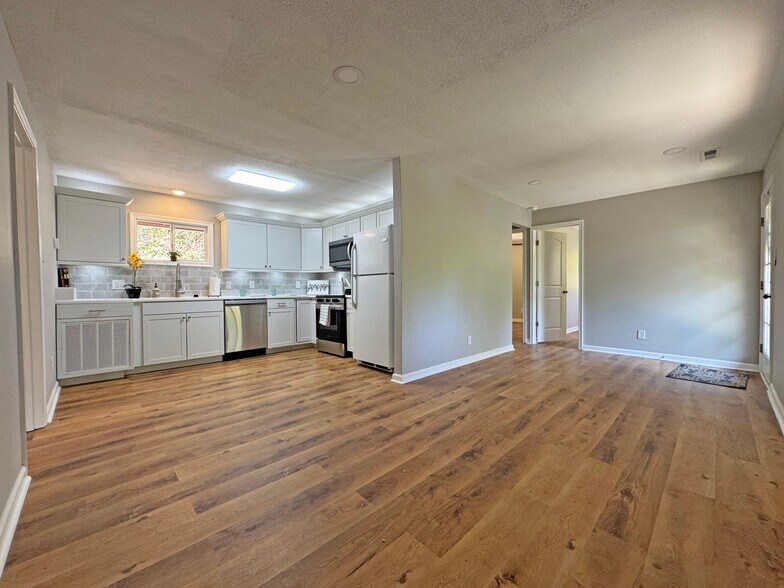 Open Floor Plan - Living Room Opens to Beautiful Kitchen - 7942 New Hope Rd