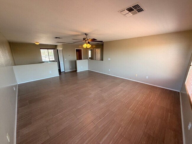 Building Photo - Updated 4x2 Buckeye Home *NO* Carpet & Downstairs Primary Bed!