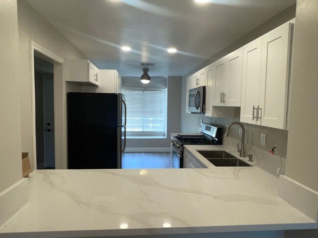 Primary Photo - Updated 2 Bedroom, 2.5 Bath Condo Includes...