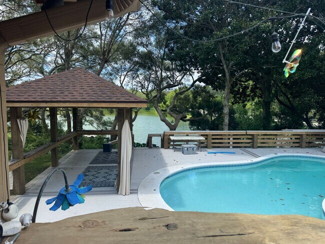 Building Photo - Executive Lakefront Retreat with Private P...