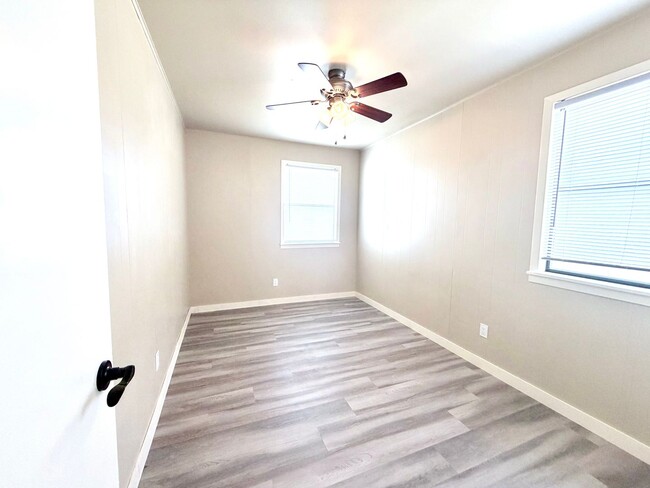 Building Photo - Stylish Two-Story Duplex with Loft, Fireplace & Private Backyard in New Braunfels!