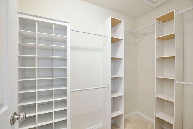 Building Photo - Immaculate Townhome · Dual En-Suite Bedrooms + Flex Loft · Cable & Internet Included · 3.5 Miles ...