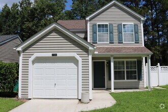Building Photo - Four Bedroom Home with Private Fenced Back...