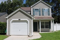 Building Photo - Four Bedroom Home with Private Fenced Back...