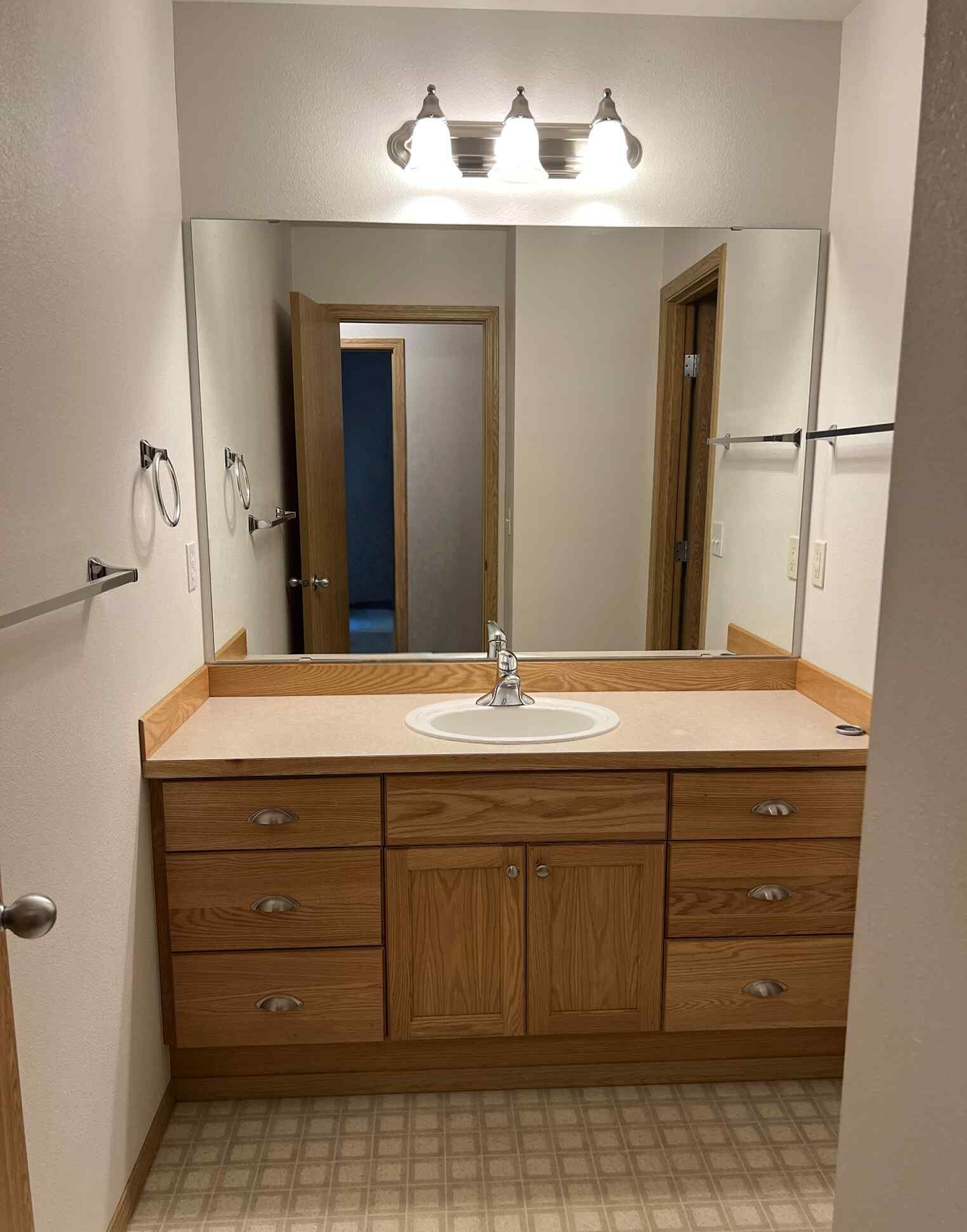 2nd full bathrooms across hall from 3rd bedroom - 6512 Newaukum Pl NE