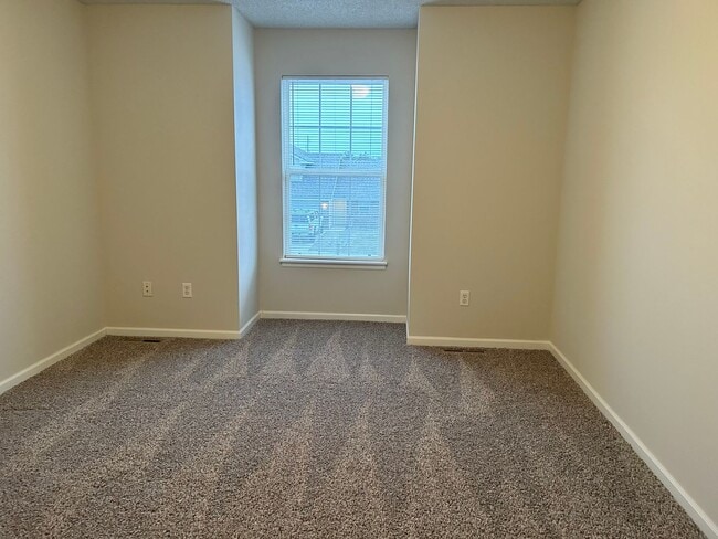 Building Photo - 3 Bed 2 Car Duplex in Grain Valley (New Flooring, Carpet, and Paint)