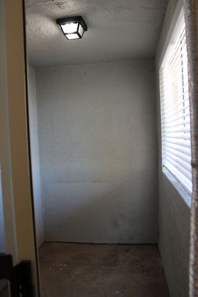 Building Photo - 2 BR, 1 and 1/2 BA Condo with 2 Parking Space