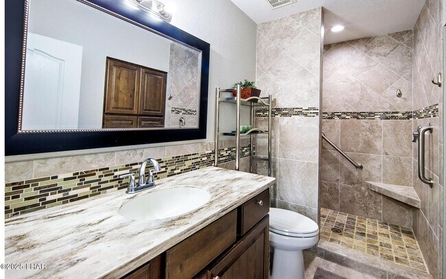Building Photo - Long Term Furnished Condo