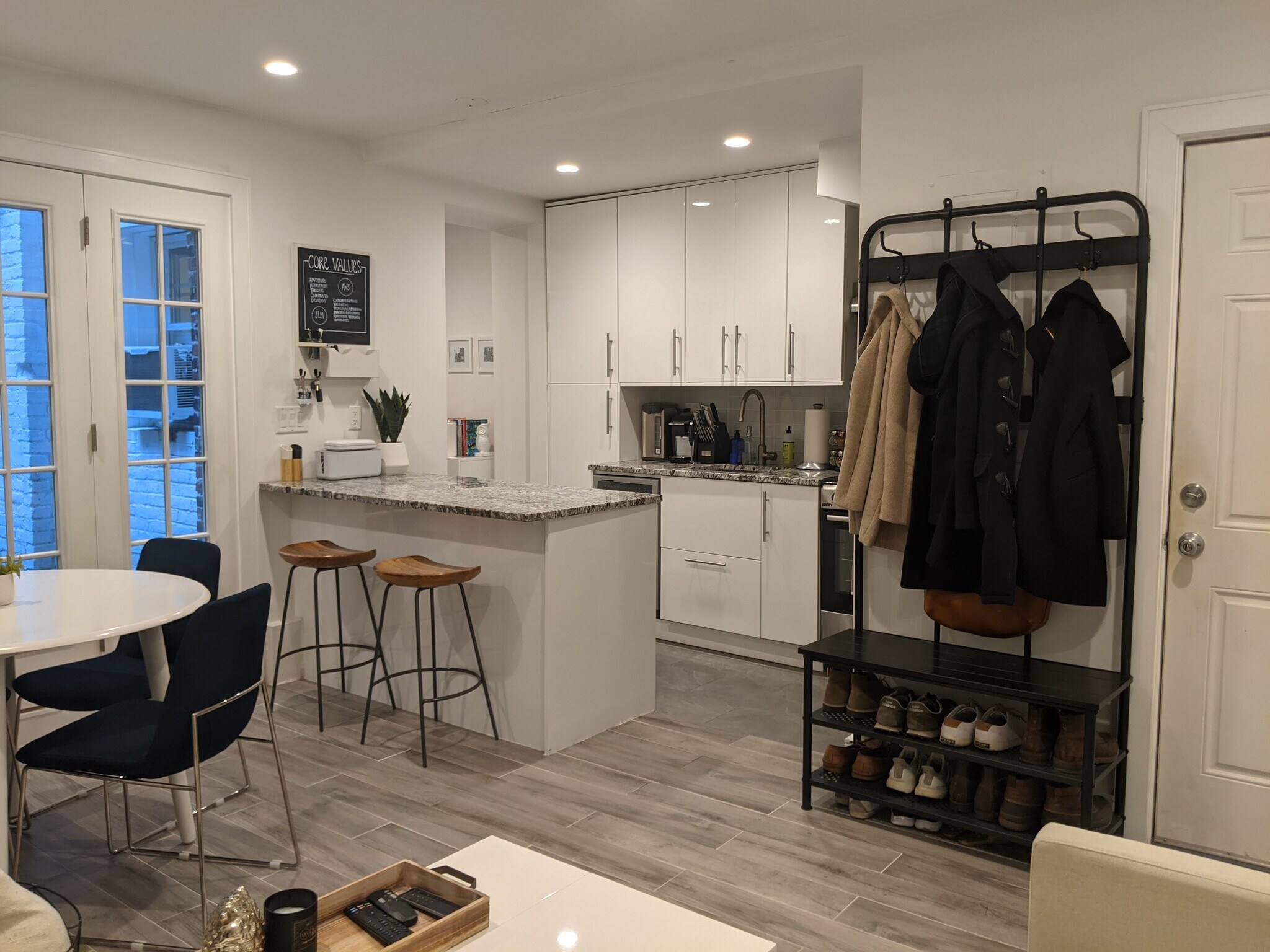 Open kitchen overlooking living area and private patio - 12 Melrose St