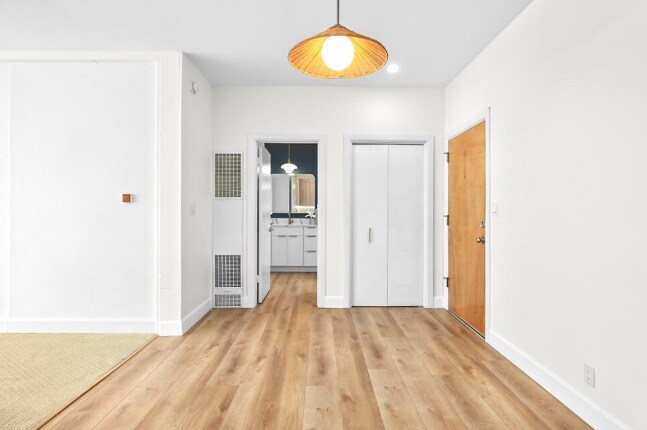 The dining room comfortably accommodates a round or rectangular table for 4 or 6. - 2221 Ocean Ave