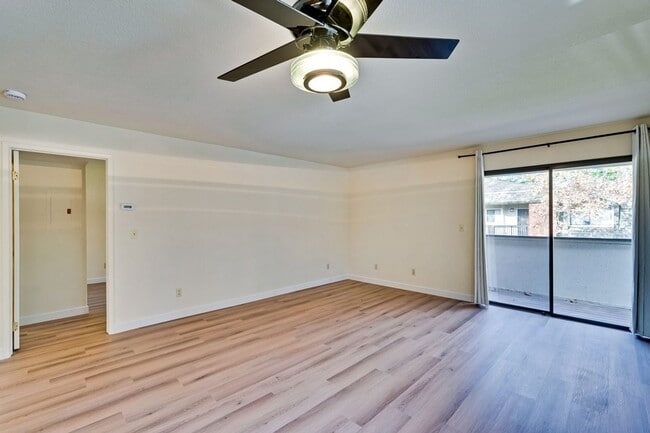 Building Photo - New Vinyl Plank Flooring, Fresh Interior Paint, 1 Car Garage + 1 Assigned Outdoor Parking Space -...