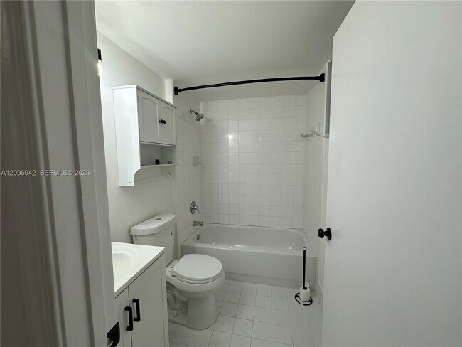 Building Photo - 3241 Sabal Palm Manor