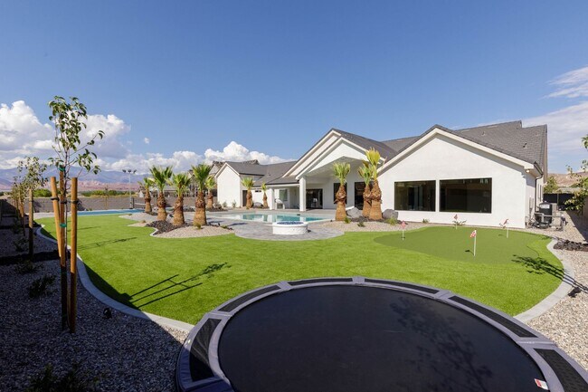 Building Photo - Gorgeous Custom Single Story with RV Garage