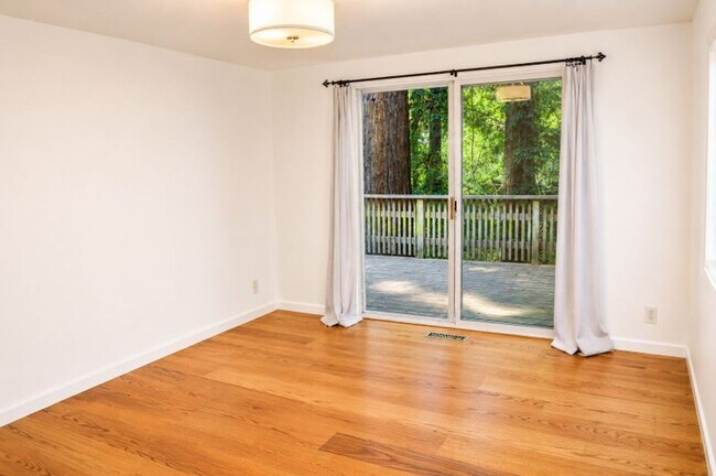 Building Photo - Serene Redwood Retreat with Updated Kitchen, Modern Baths, Fireplace & Expansive Deck