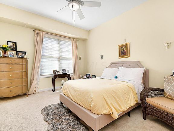 Building Photo - "Spacious 2-Bedroom Condo with Elegant Har...