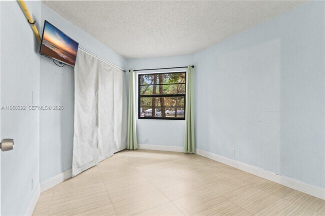 Building Photo - 10401 W Broward Blvd