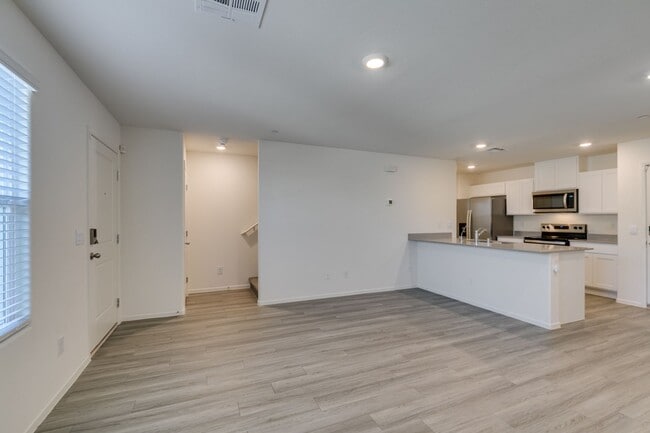 Building Photo - Gorgeous Townhome with upgrades in gated community* 3 large bedrooms, 2 car garage*Community pool...