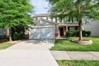 Building Photo - Spacious, Beautiful 3 BR, 2.5 bath with fenced in yard!