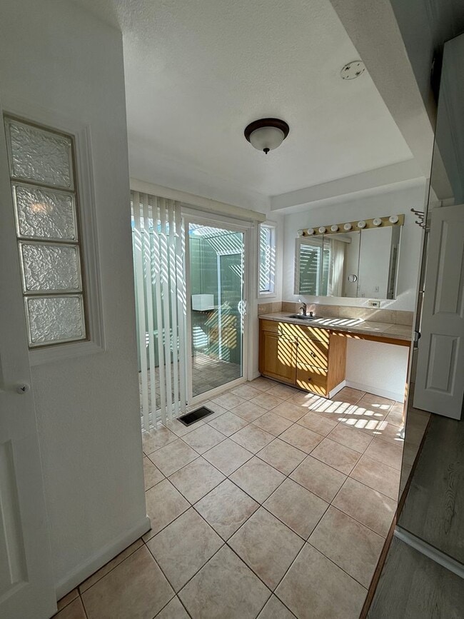 Building Photo - Hard floors, extra closets, patios & fenced yard