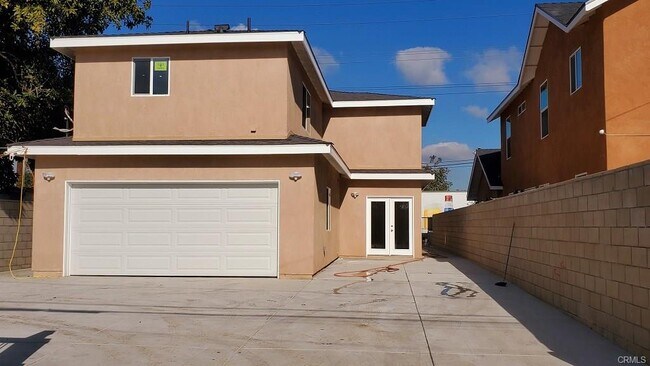 2-Car Garage and Onsite Parking - 3510 W 5th St