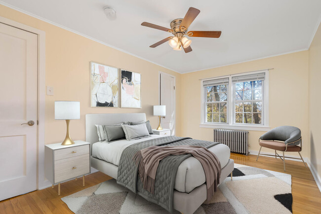 Bedroom with hardwood floors, ceiling fan/light and closet - 317 Washburn Ave