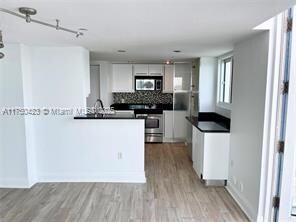 Building Photo - 7600 Collins Ave