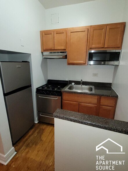 Building Photo - 948 W Cuyler Ave