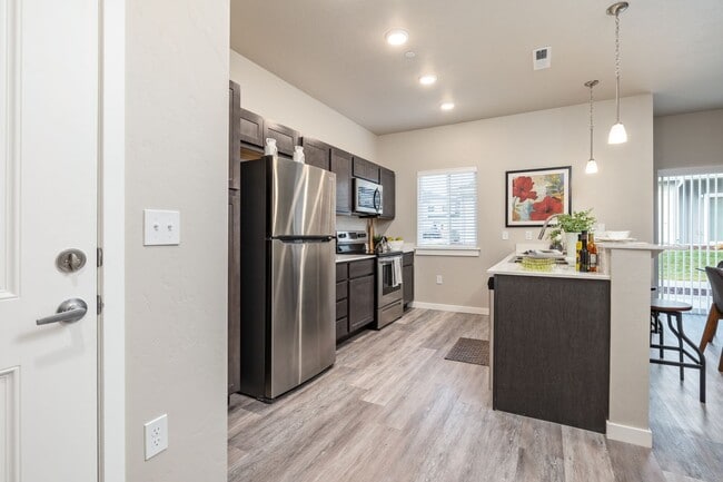 Building Photo - Wilson Creek Townhomes - $500 off with 6-months of free covered parking for move-ins by the end o...