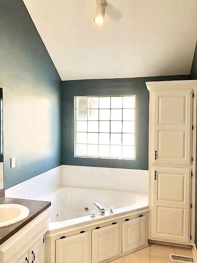 Building Photo - Spacious 4-Bedroom Greenwood Home with Vau...