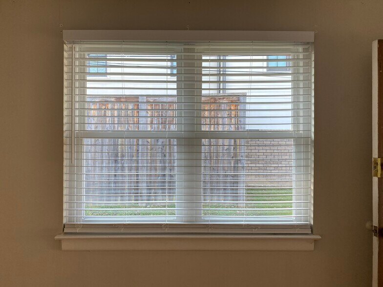 All new windows in unit with screens for letting fresh air in - 1003 Lawrence Ave