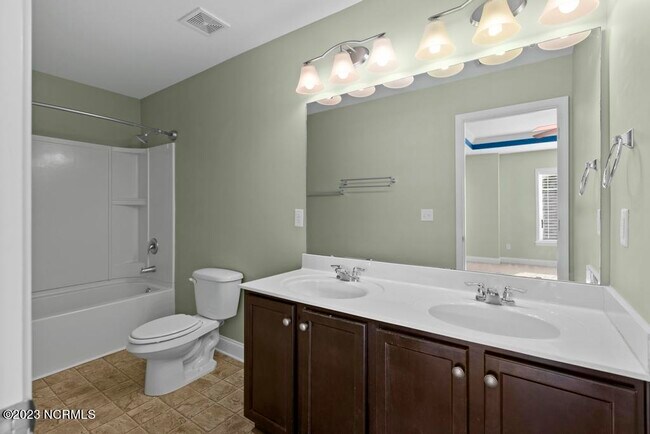 Building Photo - 303 Vilas Way S