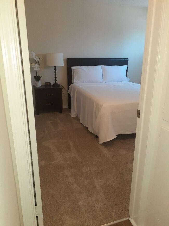 Building Photo - Welcome home to Seabreeze Garden Apartments