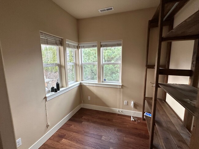 Building Photo - Vaulted Ceilings & Loft – Charming 3 Bedroom Home