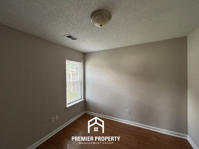Building Photo - Charming 3BR/2BA Near Southwind | High Ceilings, Hardwood Floors & 2-Car Garage