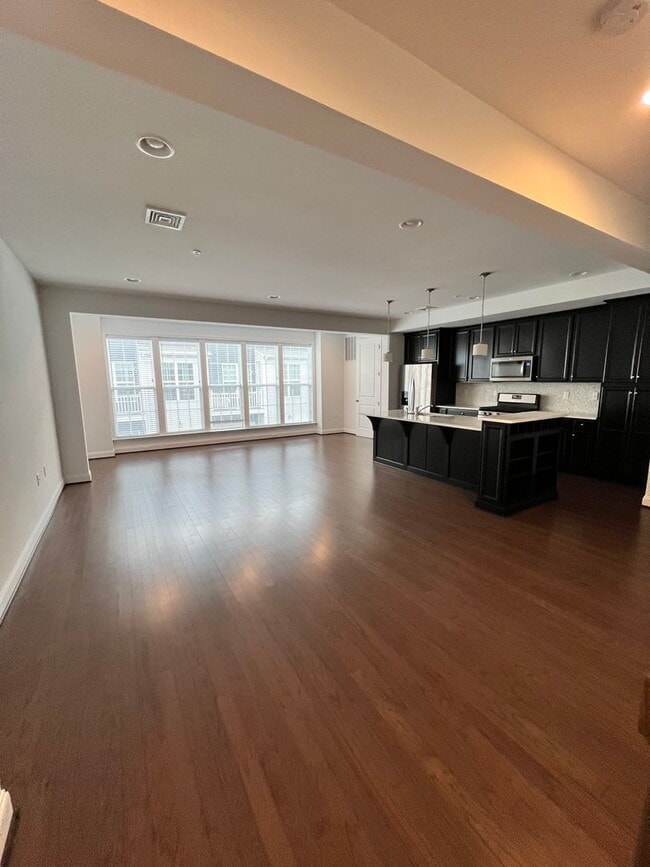 Building Photo - 2-bedroom 2.5 bath Luxury Townhome located...