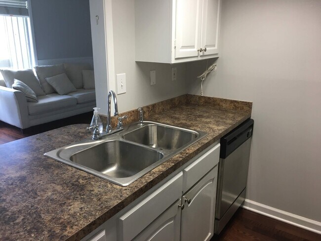 Building Photo - SOON AVAILABLE POOLSIDE CONDO!
