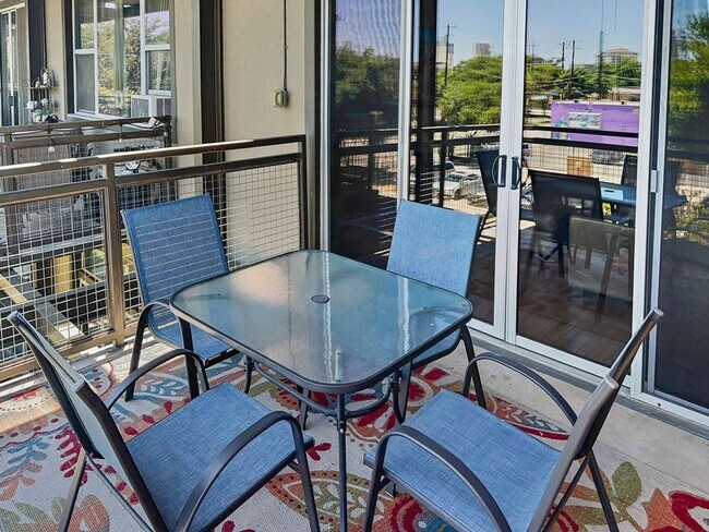 Building Photo - Modern Downtown Condo with Stunning City V...